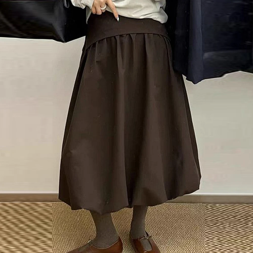 

high-waisted lantern bud skirt women's early autumn new simple fashion and thin design sense A word medium and long skirt