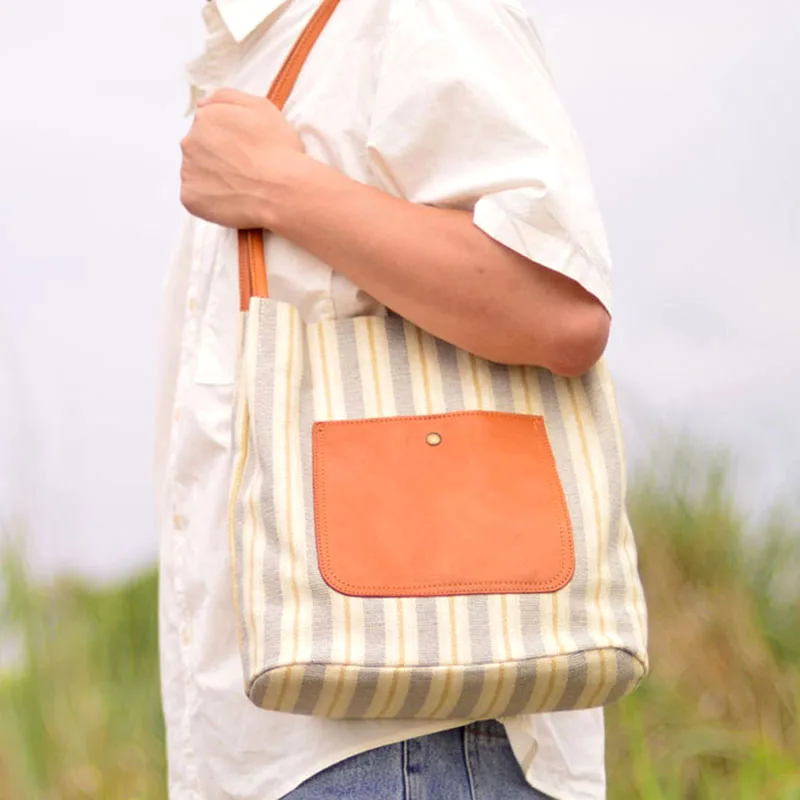 AETOO Nova bolsa de ombro único de couro da moda, sacola de ombro único versátil listrada da moda, masculina de couro simples e w