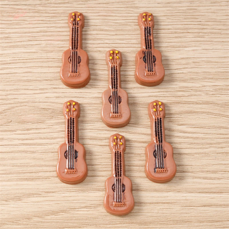 

10pcs 14x38mm Cute Resin Guitar Cabochons Flat Back Scrapbook for Jewelry Making Girls Hairpin Brooch DIY Crafts Accessories