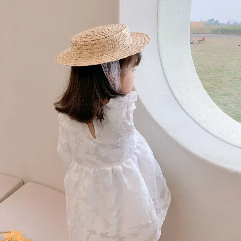 

Children Baby Girl Sunhats Small Lace Up Flat Top Outdoor Beach Holiday Summer Plaited Straw Hat Cap for Kids Decorative Props