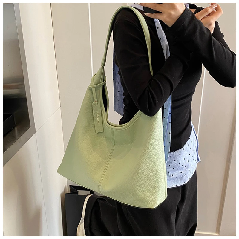 

Solid Color Premium Shoulder Bag Women 2026 New Casual Versatile Large Capacity Tote Bag Texture PU Leather Commuting Handbag