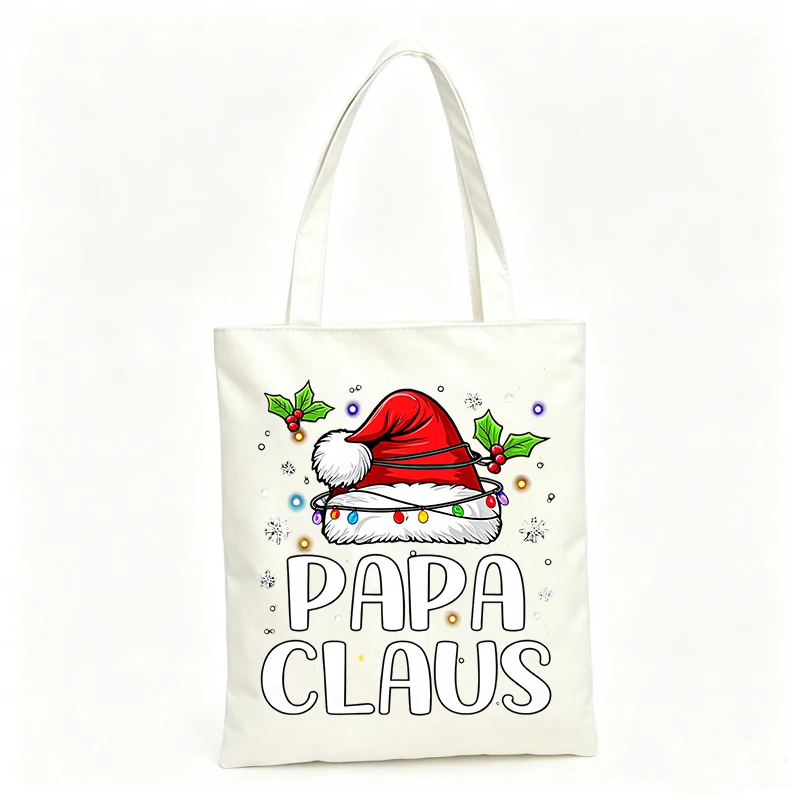 Men's canvas tote bag with Santa hat and holiday lights graphic, ideal for Christmas shopping and holiday outings