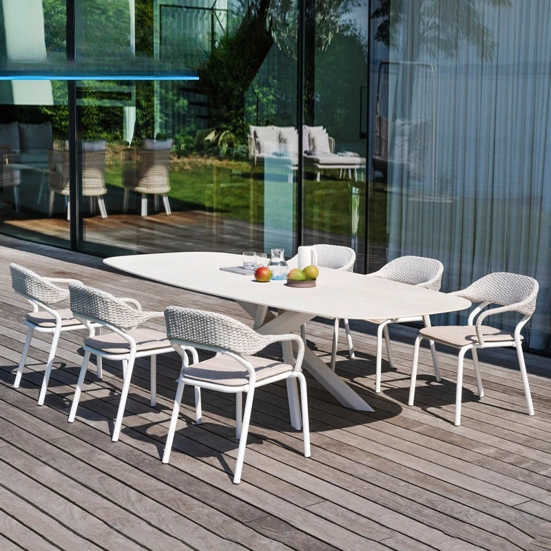 Nordic outdoor rooftop dining table and chairs Villa courtyard sunroom hotel B&B outdoor leisure rope braided rattan chair comb