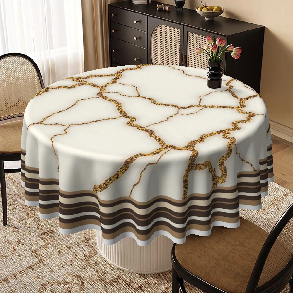 A round tablecloth, featuring a modern marble design in gold and white, is perfect for various occasions.zyc