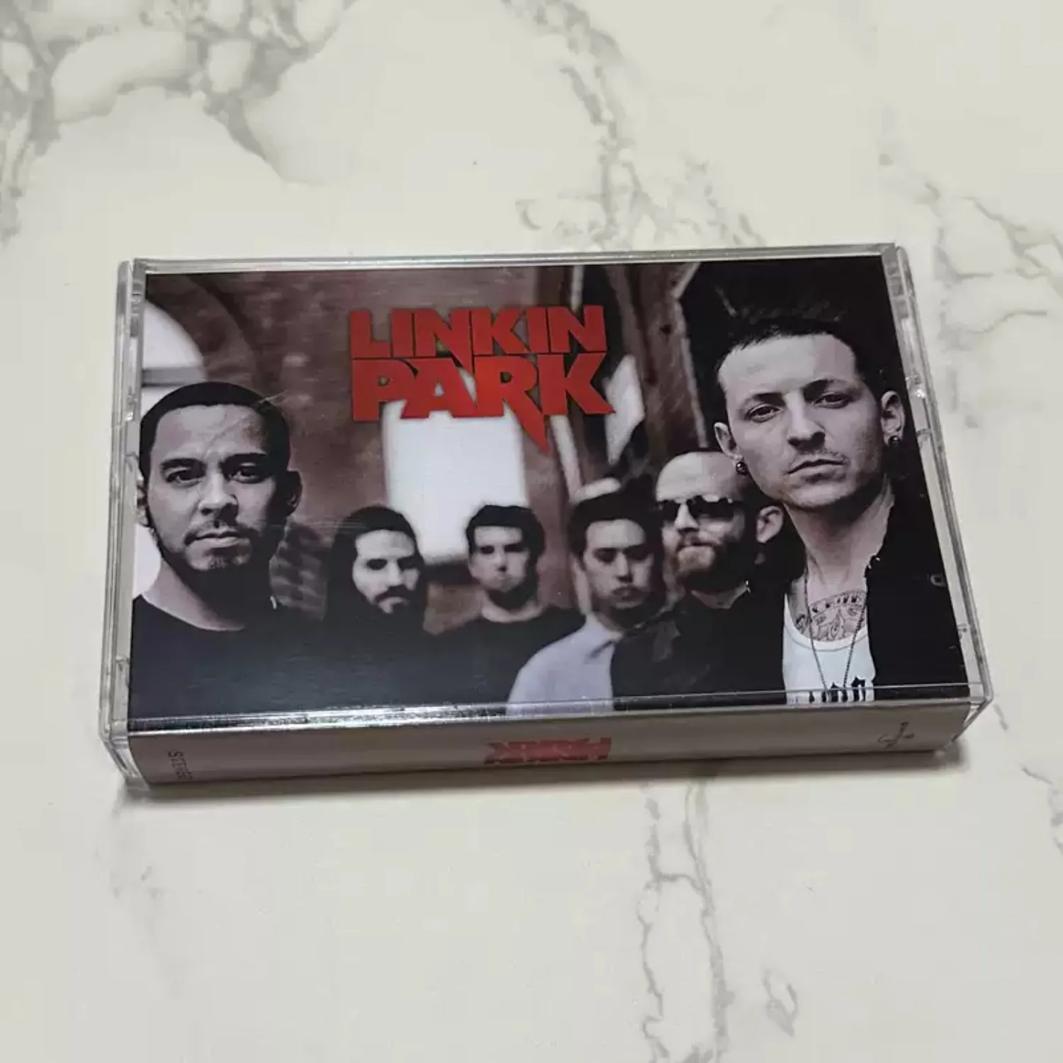 

Retro Nu Metal Cassette Tape, 2000s Alternative Rock with Heavy Riffs, Electronic Blends & Raw Vocal Energy