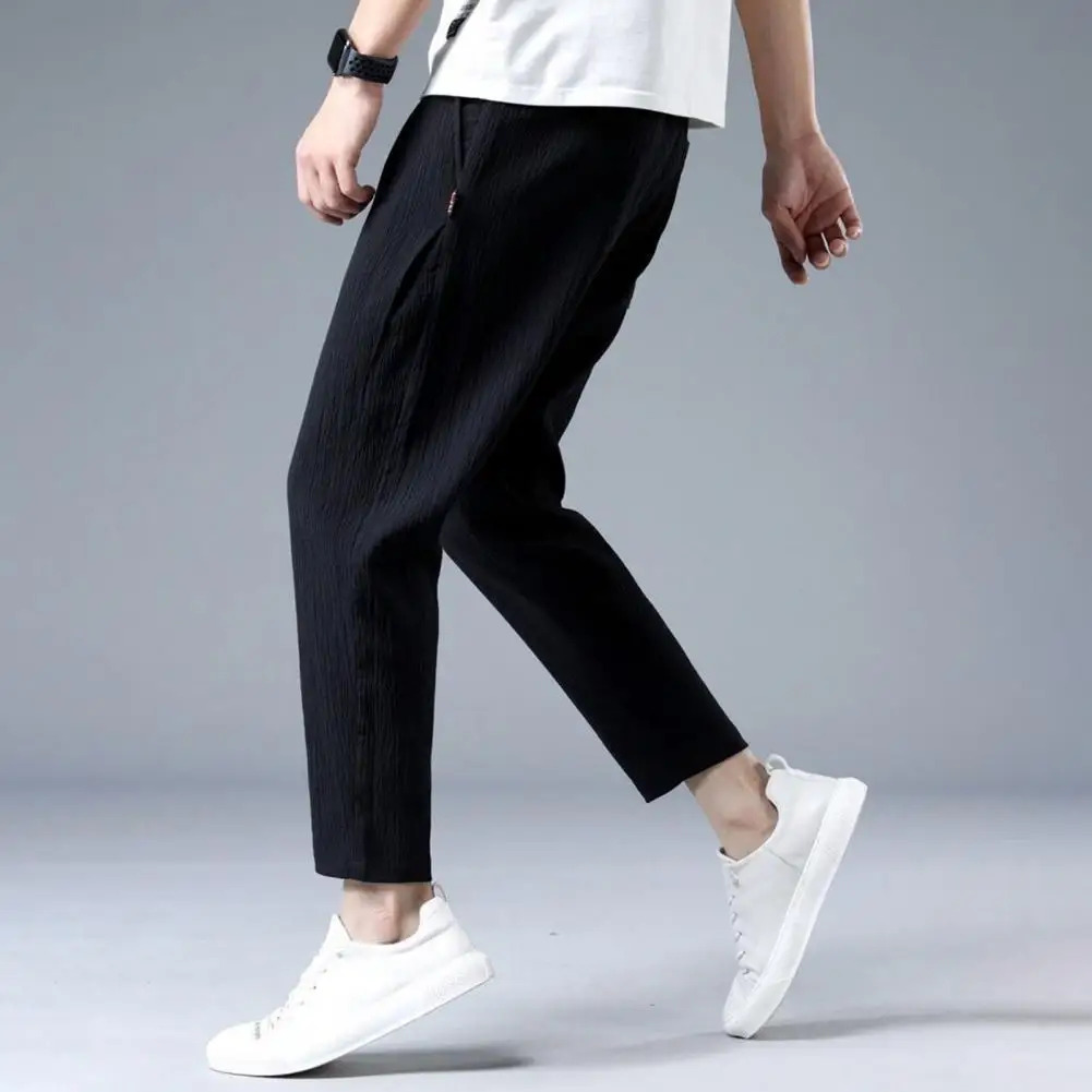 

Men Relaxed Fit Trousers Men's Drawstring Ninth Pants with Elastic Waist Pockets for Daily Wear Sport Activities Loose Straight