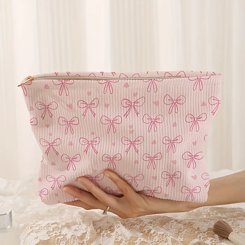 Minimally designed pink bow pattern printed corduroy zipper makeup bag, lightweight and multifunctional cosmetic storage bag