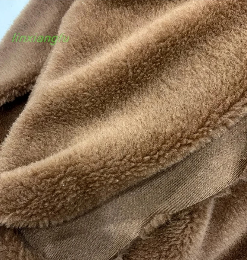 Particulate velvet full wool fur, sheep shear composite warm coat fabric.