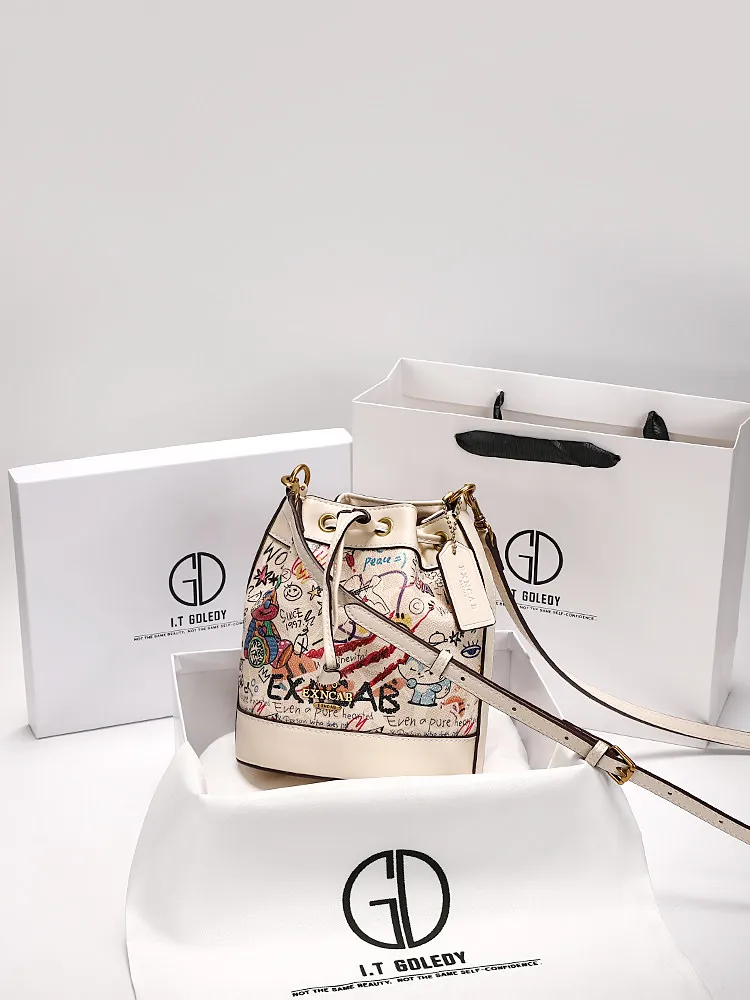 Fashion and Vintage Handheld Bucket Bag with Cute Cartoon Graffiti and Premium Leather 2026 Women's Newly Trendy Crossbody Bag