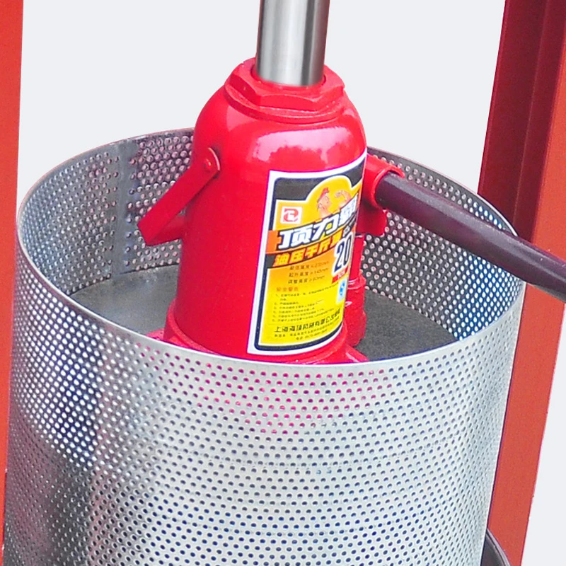 Oliepers, kleine huishoudelijke pers, handmatige olierestenpers met hydraulische krik, commerciële fruitpers