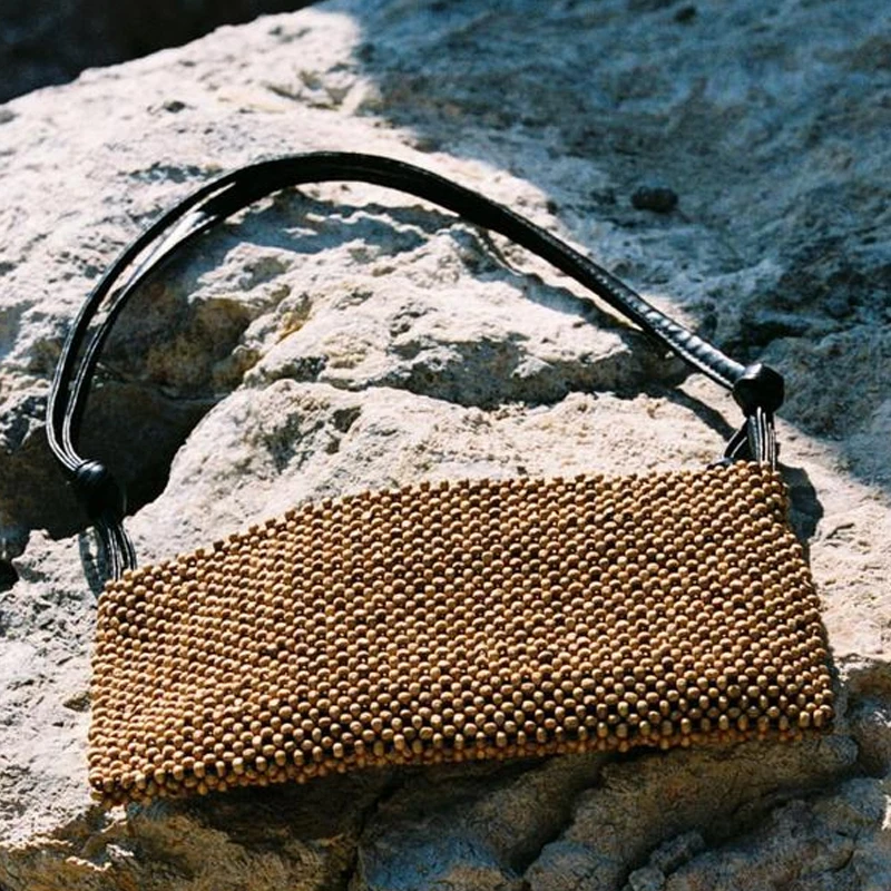 

Плетеные пляжные сумки ручной работы для женщин: роскошные дизайнерские сумки и клатчи 2026 года, новинка, из деревянных бусин, тонкие, на плечо/подмышку