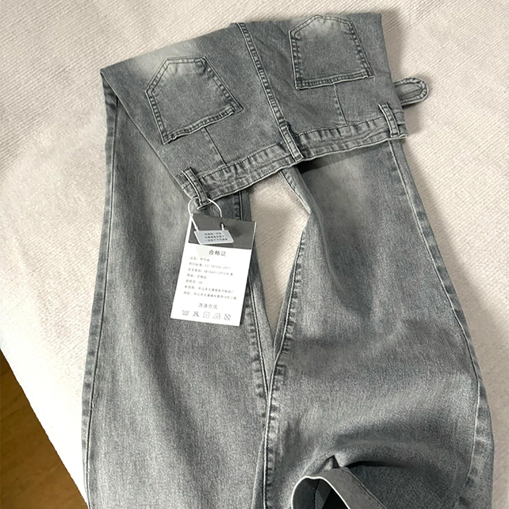 女性レトロ洗浄フレアジーンズアメリカンヴィンテージ秋ハイウエストグレーロングブーツカットパンツダメージデニムパンツストリート