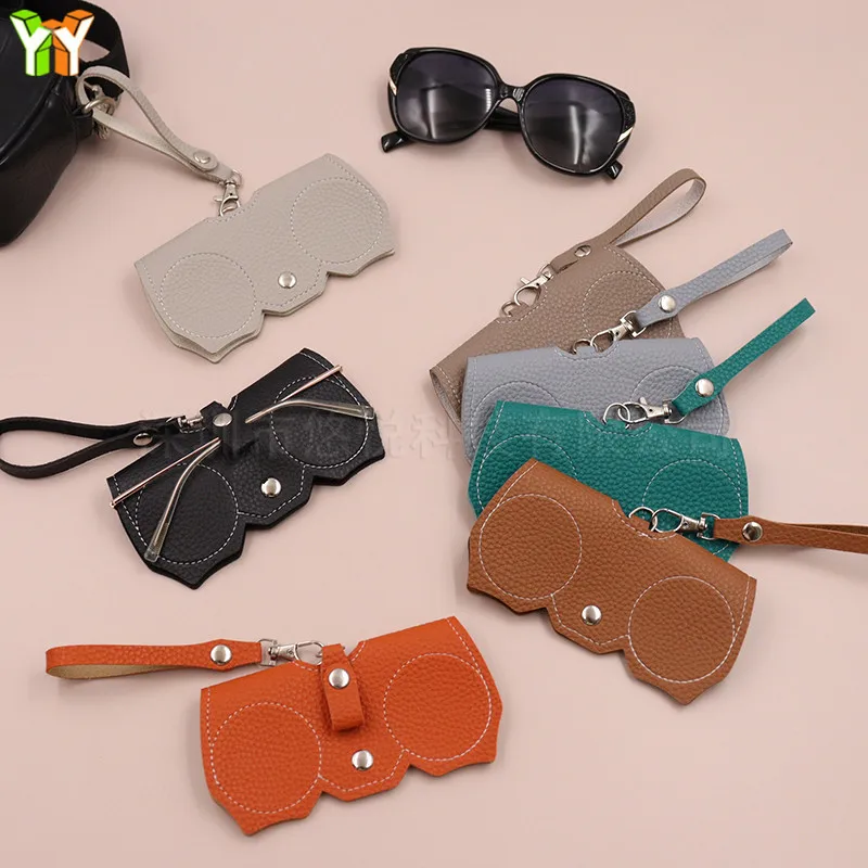 

New spot pressure resistant PU leather sunglasses bag pressure relief glasses clip gift bag hanging glasses clip accessories