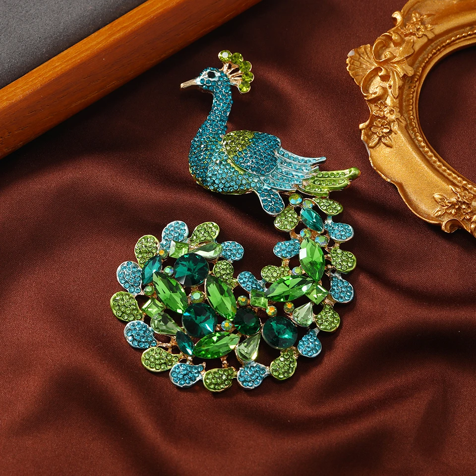 

Muylinda Vintage Big Luxury Peacock Brooch Crystal Party Banquet Bird Brooches For Woman Clothes Suit Clip Pins