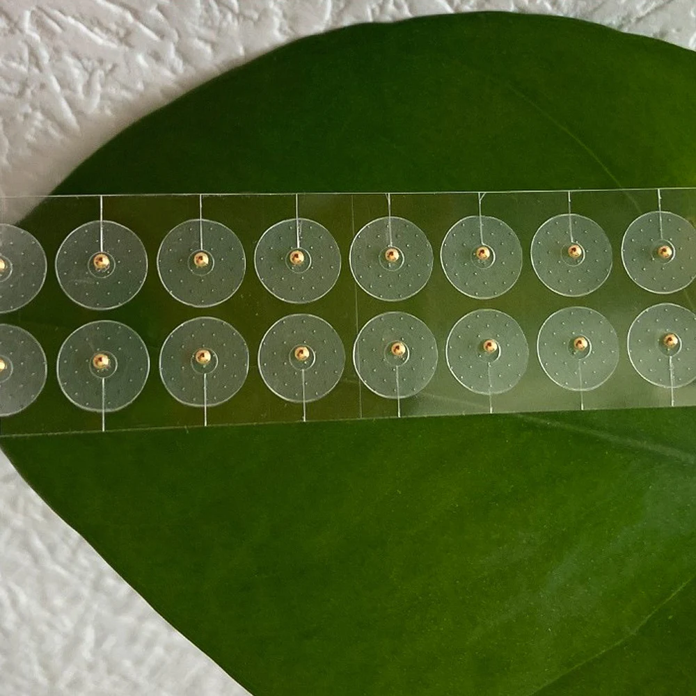 100 Uds. Semillas para el cuidado de los oídos, pegatinas desechables para los oídos, terapia de masaje, parche de aguja, Auriculoterapia Auricular