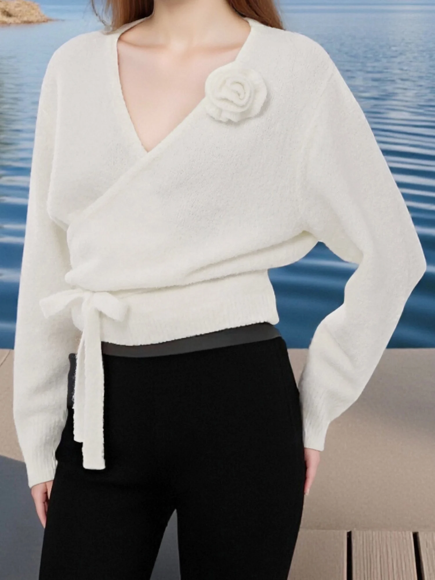 

Ladies Cozy Knitted Jumper with Floral Detailing and Stylish Tie-up Design Perfect for Chilly Autumn and Winter Days