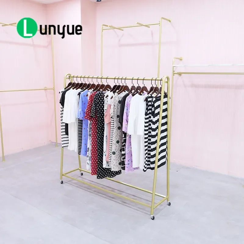 European Gold Light Luxury Movable Floor Clothing Display Rack for Women's Garment Store High End Retail Shop Clothes Hanger