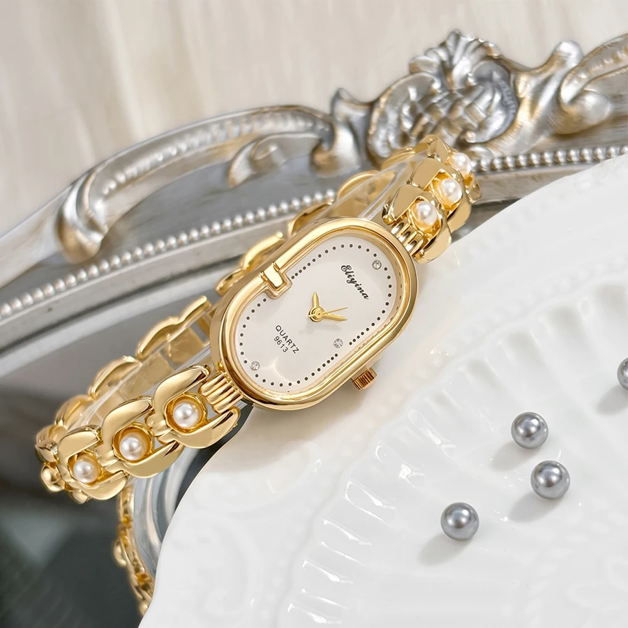 Elegant Oval Track Dial Pearl Embellished Strap Gold Watch for Woman