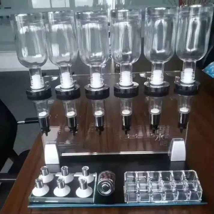 Neu gestaltete günstige 6-Flaschen-Parfümspenderflasche, drehbare Füllmaschine, Parfümriegel