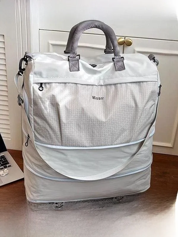 large-capacity-lightweight-travel-bag-with-universal-wheels-for-women-foldable-luggage-bag-with-wheels-leisure-style-tourist-bag
