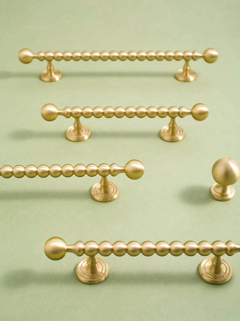 Three sizes of beaded cabinet pull with matching knob