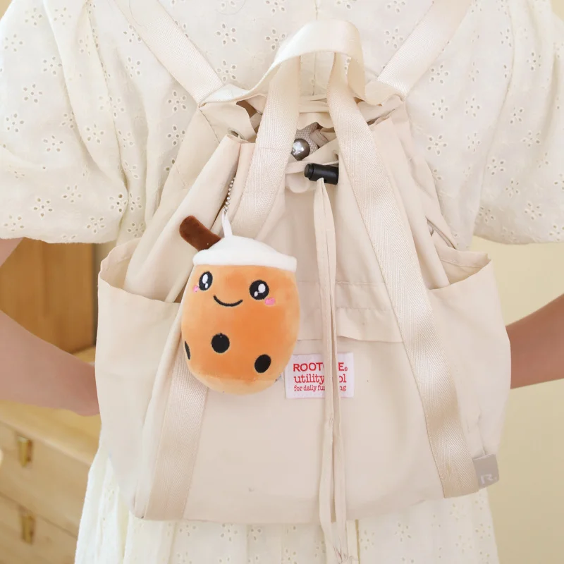 Krzyżująca się linia handlu zagranicznego, nowa, urocza, mała lalka w kształcie filiżanki herbaty mlecznej, uroczy breloczek, ozdoba do plecaka, pluszowa zabawka, kolory wysyłane losowo.