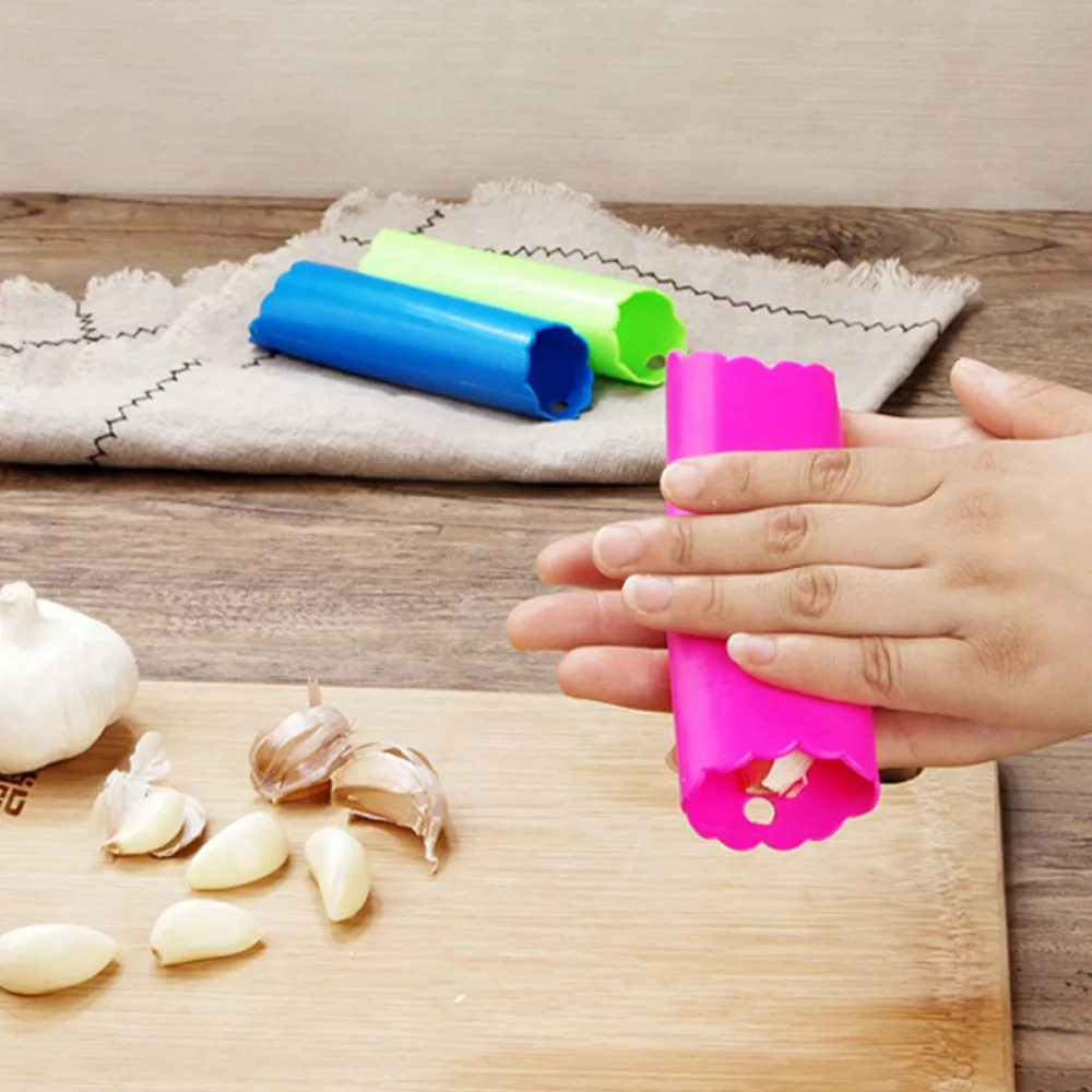 

Safety Household Silicone with Hole Garlic Roller Tube Garlic Peeling Press Garlic Skin Remover Garlic Peeler