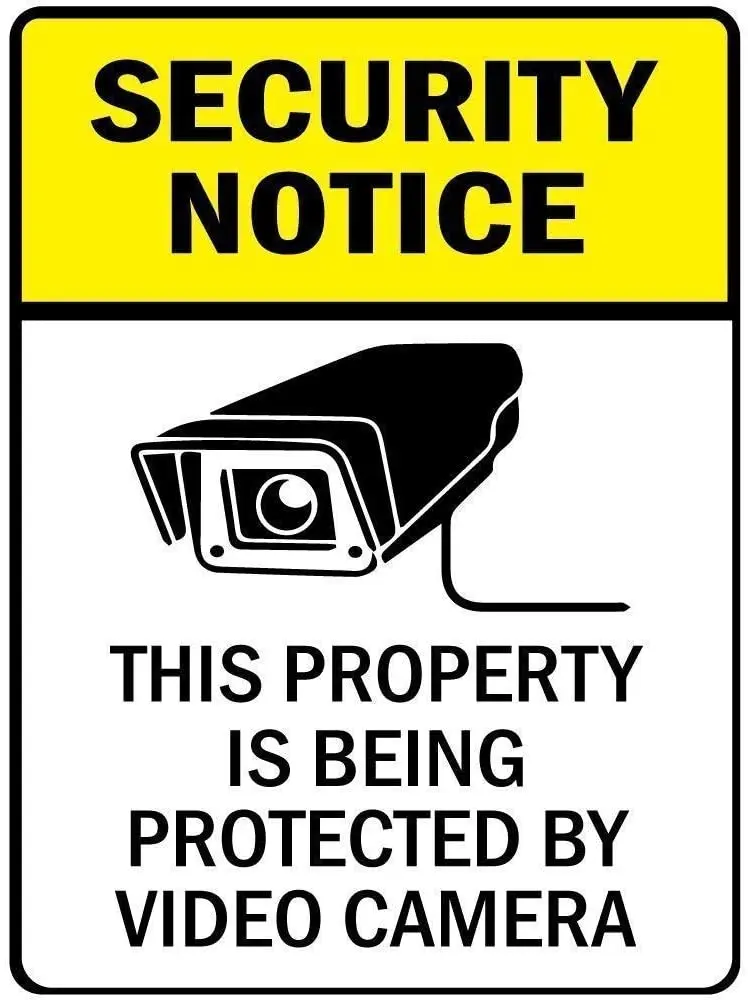 The property is a retro metal sign protected by a camera, an entrance sign, a tin sign, and a wall art deco