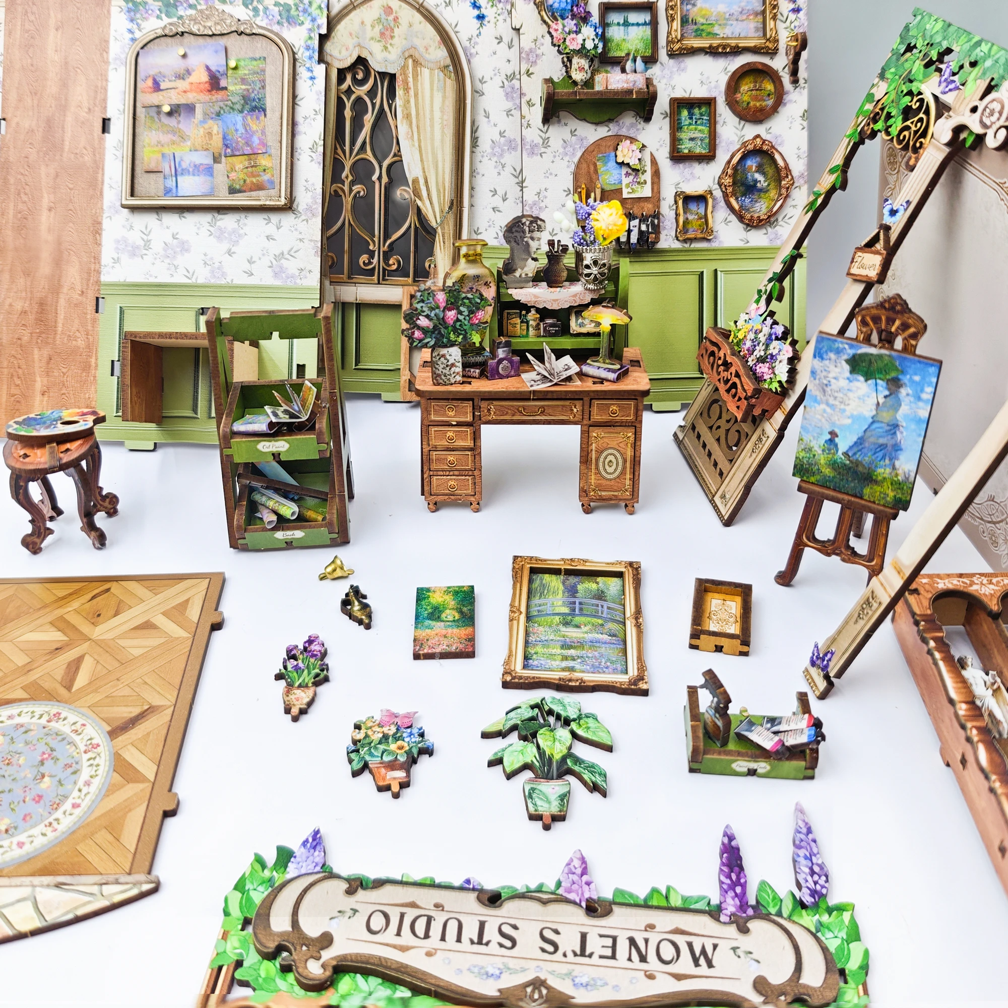 ชุดประกอบชั้นวางหนังสือไม้ DIY รูปแบบสตูดิโอของโมเนต์ พร้อมไฟและที่กั้นหนังสือรูปดอกไม้ เหมาะสำหรับเป็นของขวัญวันเกิดให้เพื่อน