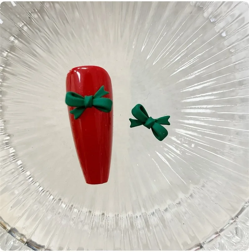 10 stücke Weihnachten Grün Kawaii Bogen Nail art Charms 3D Japanische Legierung Fliege Schmuck Nagel Strass Dekoration DIY Zubehör