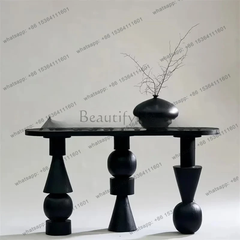 

solid wood entrance table, home designer model, against the wall, black entrance table, creative sofa, small table on the backH
