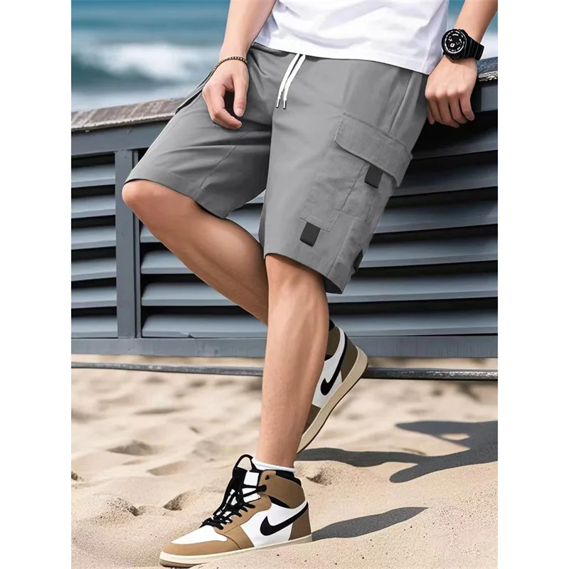 2025 صيف جديد نمط الرجال لون نقي عادية الرياضة الركض البضائع السراويل الرجال فضفاضة مستقيم الساق متعددة جيب خمسة أرباع السراويل ﻿