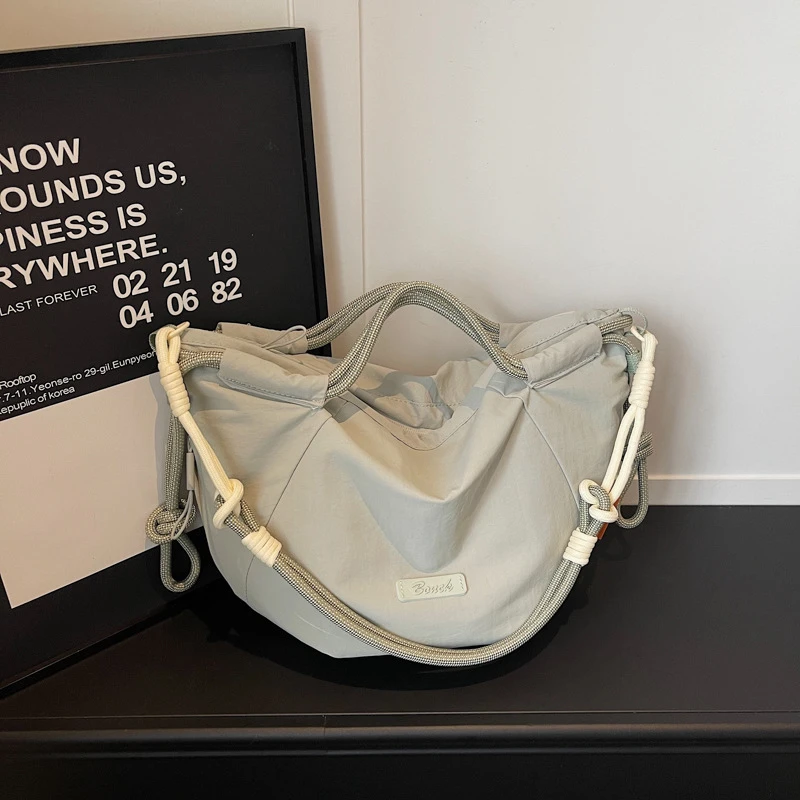 

Retro Sport Drawstring Handbag Contrasting Lightweight Multi Pocket Shoulder Bag Versatile Hiking Large Capacity Crossbody Bag
