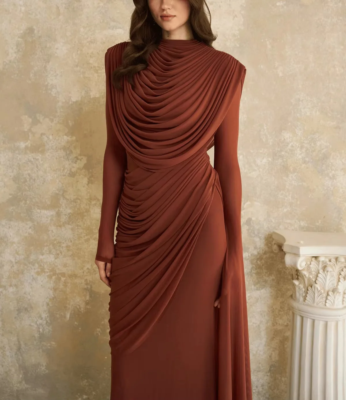 Cowl neck long sleeve long gown with structured shoulders. Ruched waist highlights body curves. Custom sizes available, soft dra