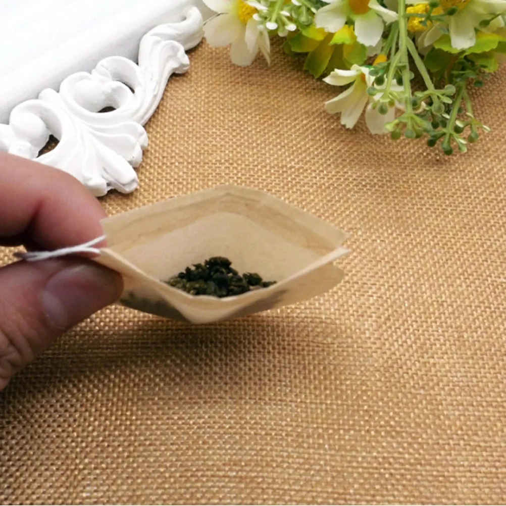 100Pcs Disposable Paper Tea Filter Bags Drawstring Round Wood Pulp Strainer for Loose Leaf Tea Coffee Herbal Powder Brewing Home
