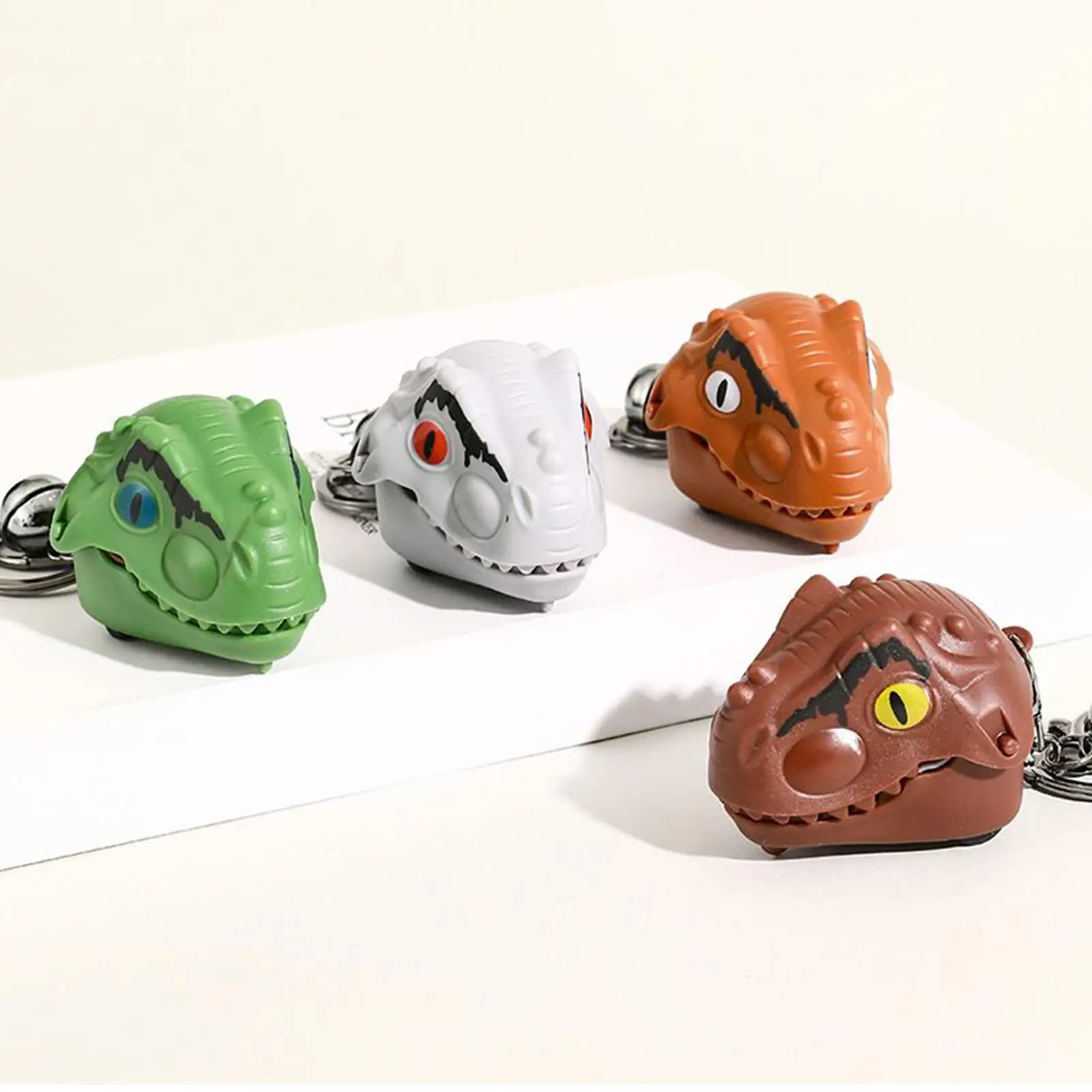 Lindo llavero realista de dinosaurio, colgador de mochila versátil y a la moda, llavero de Animal bonito para morder el dedo, regalo de viaje