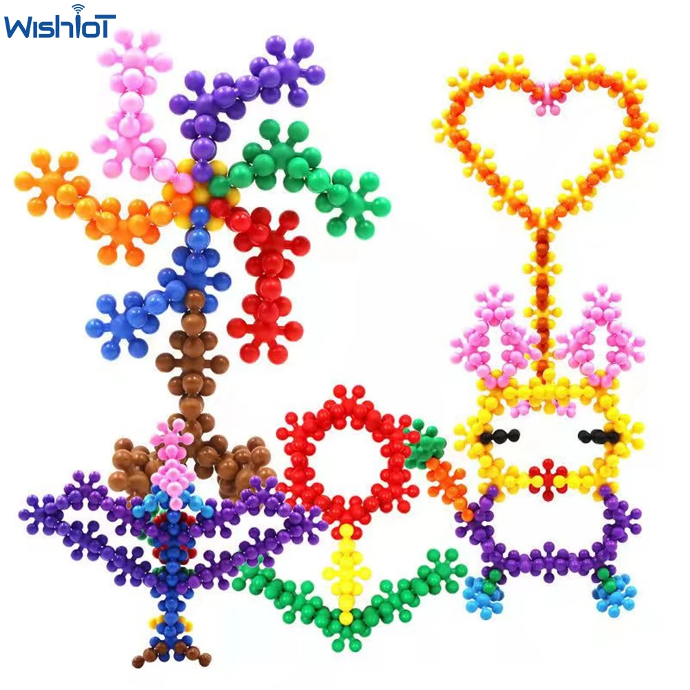 

Color Plastic Plum Blossom Building Blocks 3D Rotatable Snowflake Bricks DIY Puzzle Toys Kids Early Educational Boys Girls Gifts