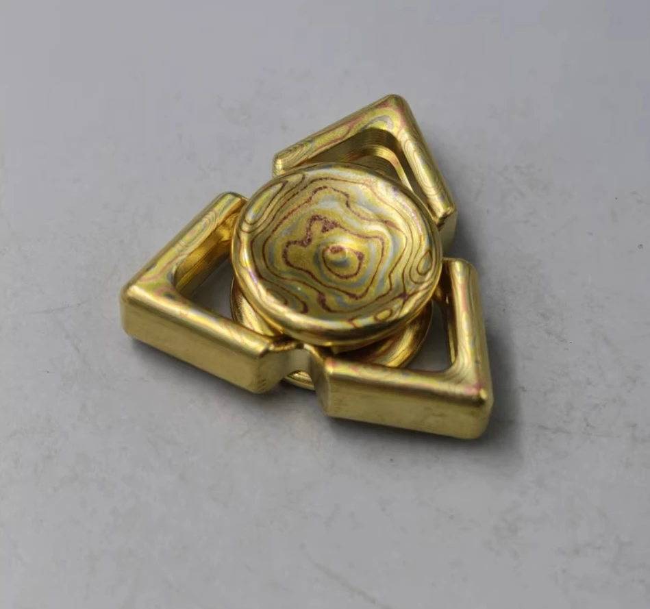 Używany spinner EDC Linglong Mokume, zabawka antystresowa.