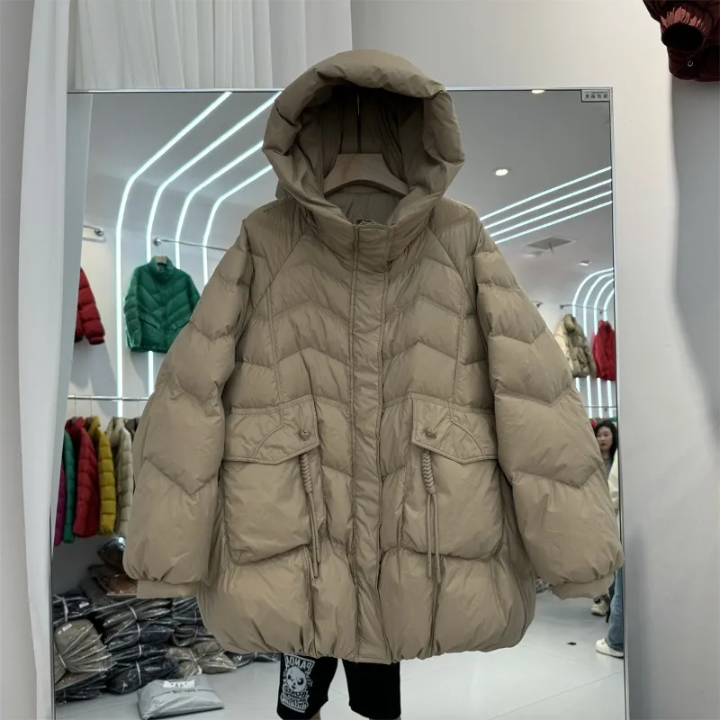 Hiver chaud nouveau à capuche en duvet de canard blanc ample vêtements d'extérieur matelassés poches manteaux vêtements pour femmes haut de gamme grande taille doudoune