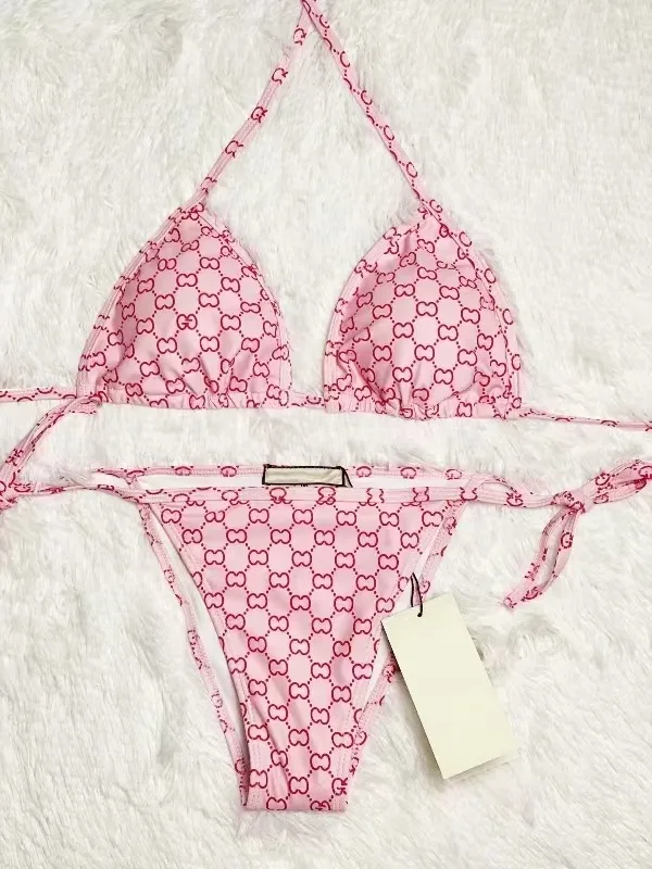 

2026 Summer New Women's Outdoor Beach Swimsuit Sexy Hanging Neck Strap Split Bikini sexy backless print swimsuit set Fashion