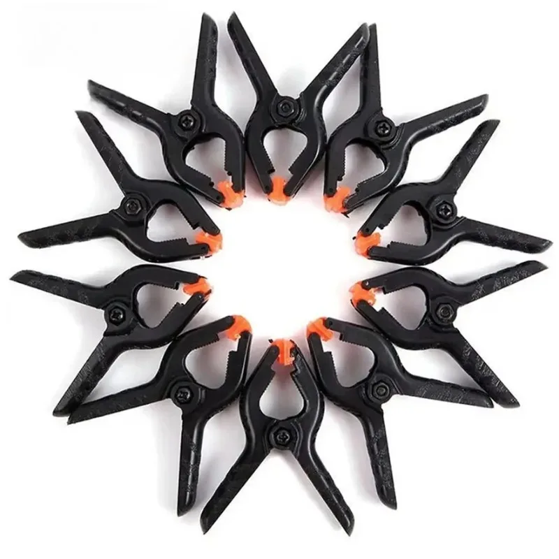 

Многоцелевые сверхмощные пружинные зажимы — 2-дюймовые пластиковые зажимы для фонов для фотостудии (муслин/холст/бумага/зеленый экран)