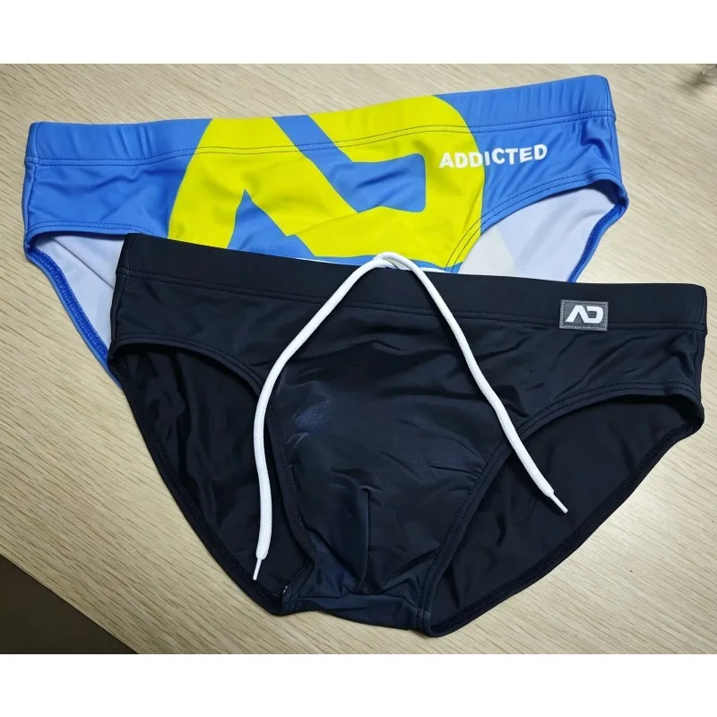 

Мужские плавки-брифы 2026 года: модные, с низкой посадкой, из ультратонкого нейлона, с принтом, реальные фото. Модель ADS045.