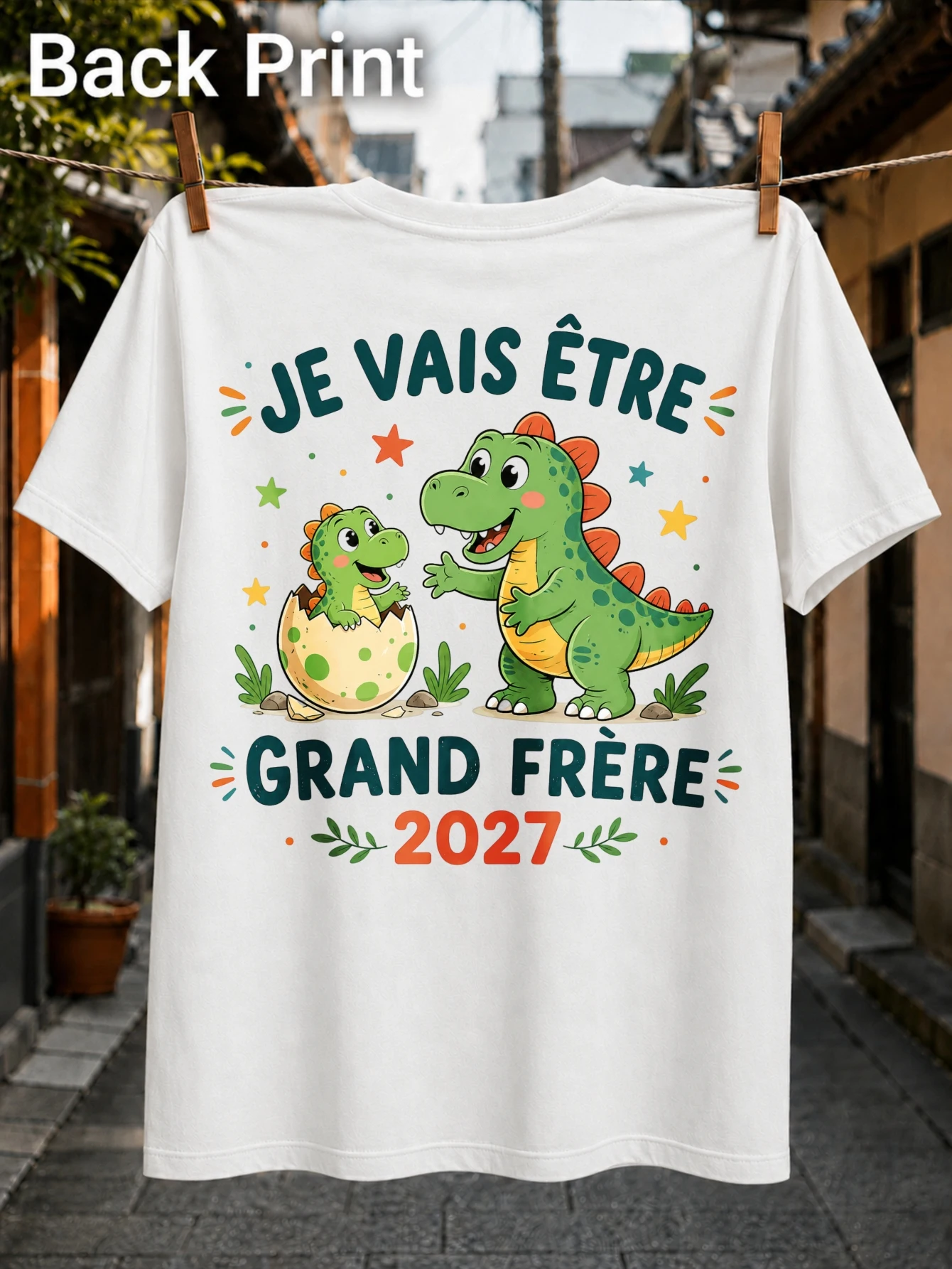 Je Vais etre Grand Frre 2027 lettering with friendly dinosaurs ching egg stars and playful sibling  Unisex All T-Shirt