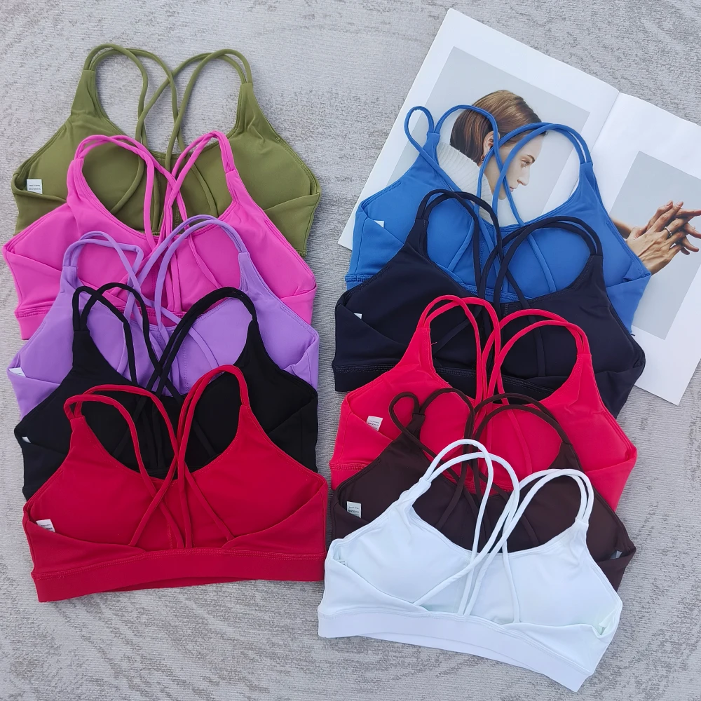 Sports bra with thin shoulder straps, crossed back, medium intensity yoga Pilates training, sports bra