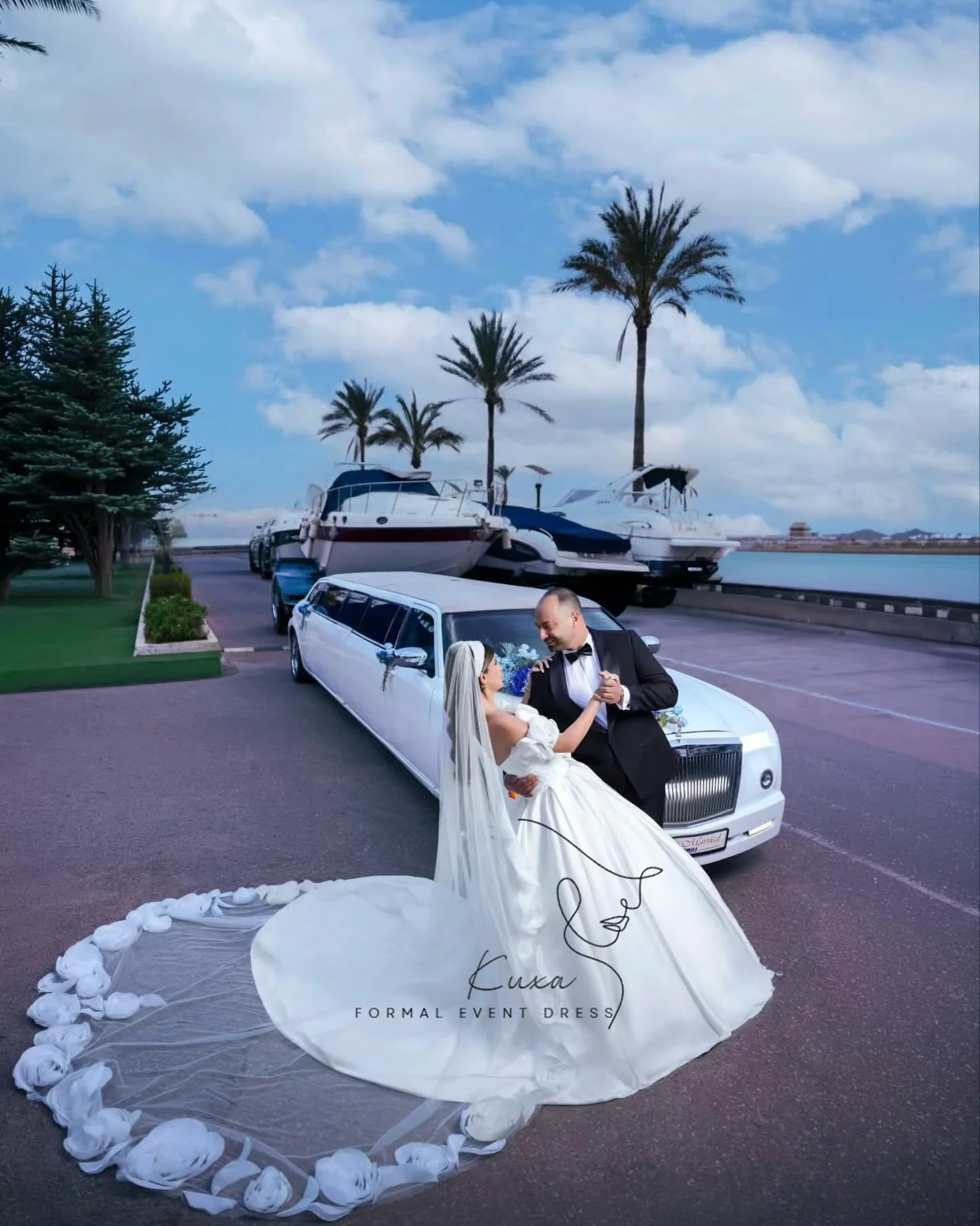 KUXA Customized Satin A‑Line Wedding Dress Off Shoulder Puff Short Sleeves 3D Floral Cathedral Train Bridal Gown For Women 2027