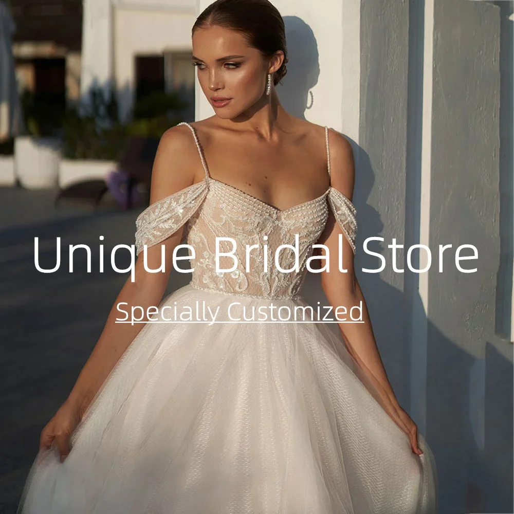 Abiti da sposa sexy personalizzati Cinghie per spaghetti con spalle scoperte Sweep Train Tulle di alta qualità per le donne Nuova moda Bri