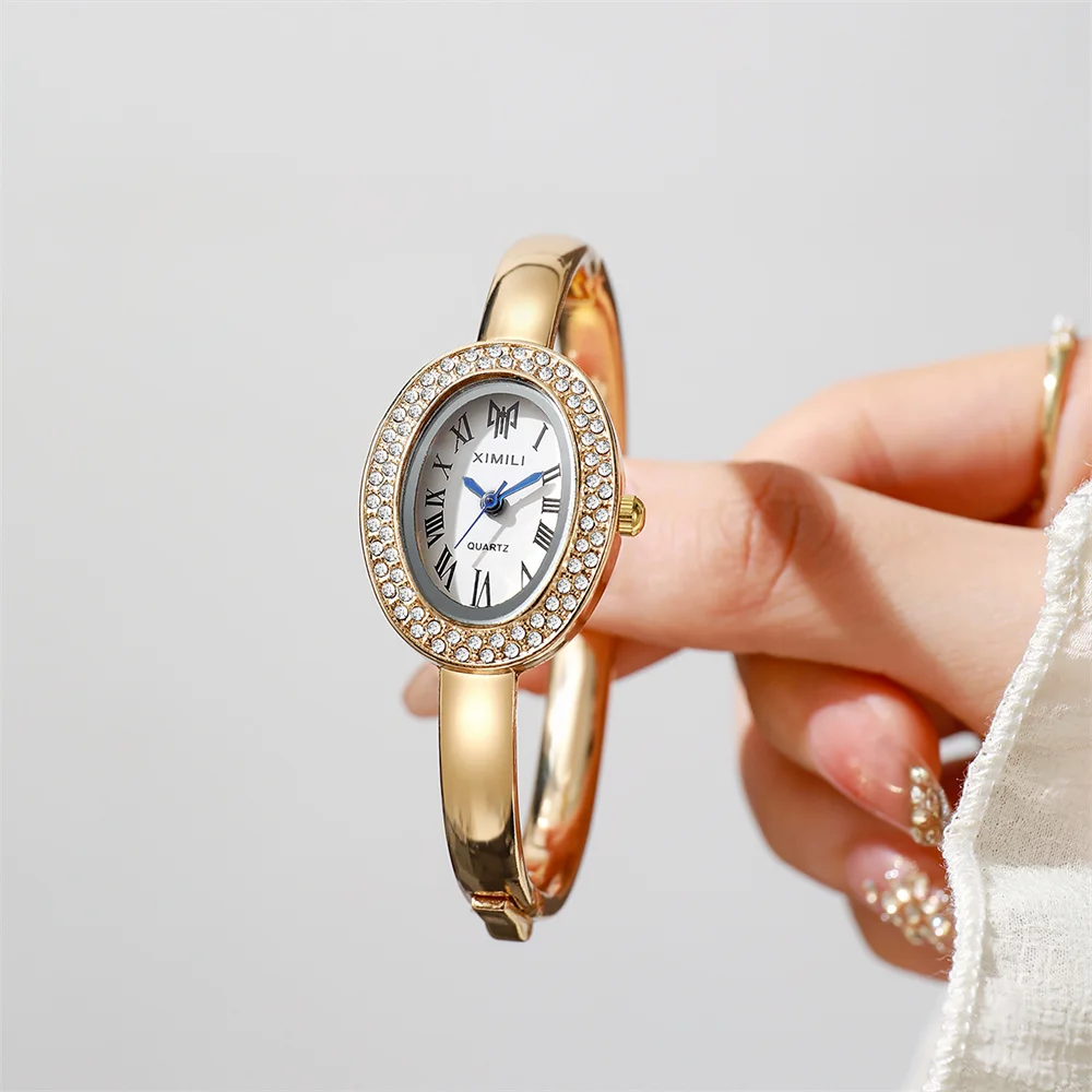 Elegant Women's Oval Bangle Watch Crystal Bezel Gold Tone Quartz Wristwatch Ladies Dress Watch
