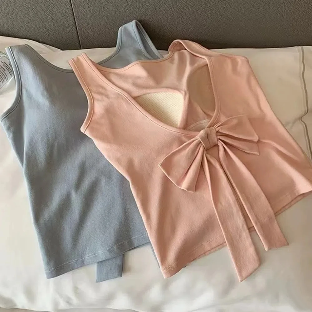 قميص قصير ناعم بدون أكمام بدون أكمام بلون سادة مع فيونكة كورية على شكل فيونكة علوية بقصة ضيقة ملابس الشارع الشهير مع وسادات صيفية على شاطئ البحر