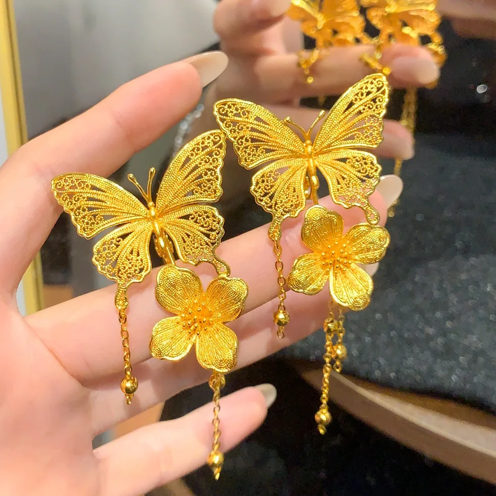 Flower silk butterfly flower fringe ear clip type miscellaneous build hollow wedding earrings female 9999gold