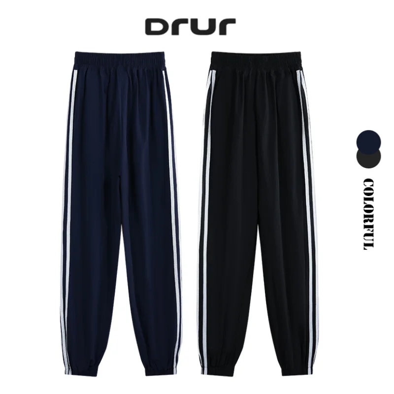 DRUR Side Striped Yoga Sweatpants For Women With Parachute Elastic Waist Baggy Sports Pants Wide Leg Jogger Pants With Pockets